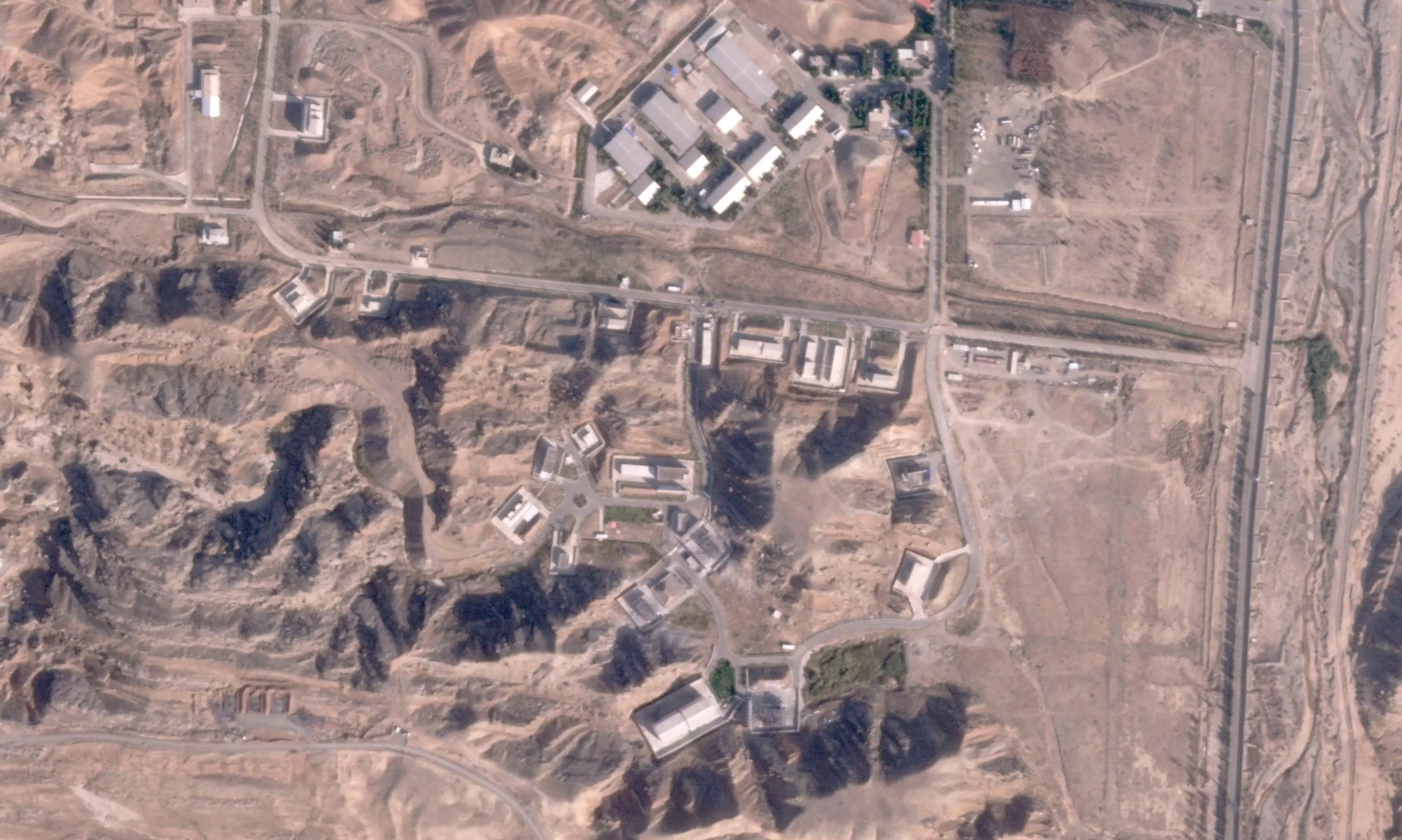 Satellite images show damage from Israeli attack at 2 secretive Iranian military bases