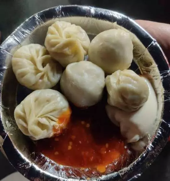 Food inspectors raid 110 momo outlets after woman's death