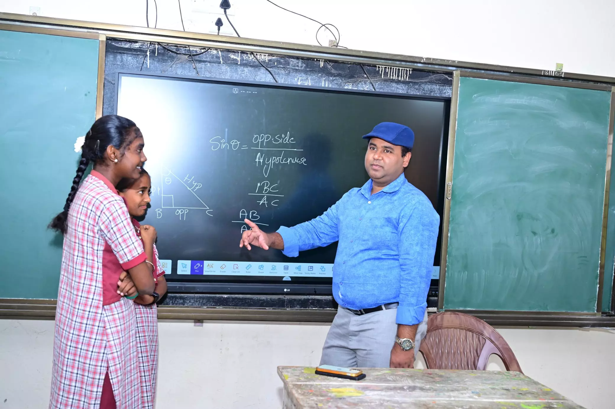 Medak collector turns teacher, teaches Trigonometry to class X students