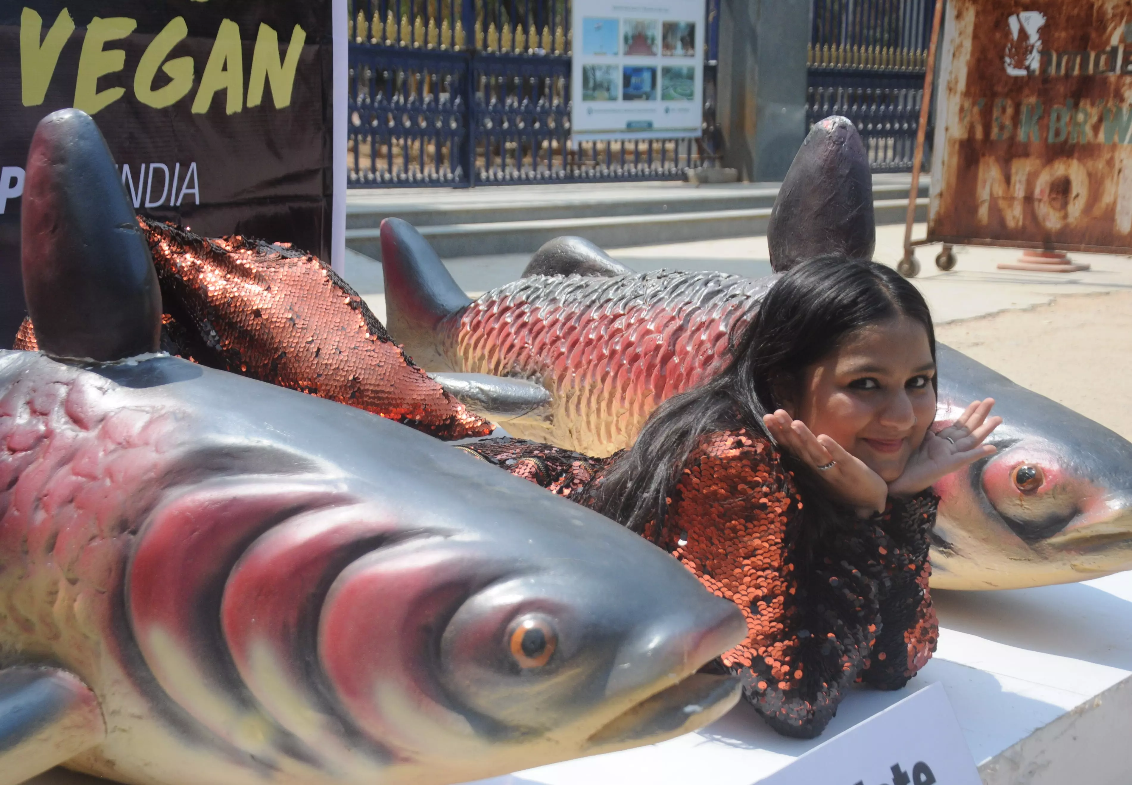 PETA India supporter stages protest against inhumane killing of fish