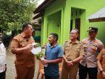 Pj Bupati Pidie Jaya Serahkan 155 Unit Rumah Bantuan dari Pemerintah Aceh dan BMK