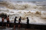 Thousands without power as cyclone lashes Australia