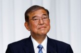 Japan PM blames election result on scandal 'suspicion, mistrust and anger'