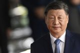 Xi highlights AI risks, warns against US-China decoupling