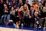 NBA: Stephen Curry scores 28 as Warriors hold off Knicks