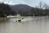 Flooding hits US southeast as snow, frigid cold forecast for NE, Plains