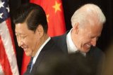 Xi says he will work with Trump team as he meets Biden