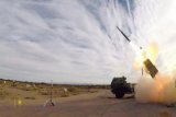 Ukrainian troops launch 2 HIMARS rockets at Kherson' village