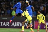 Esteghlal, Al Nassr share the spoils