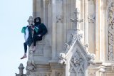 Man with Palestinian flag arrested after scaling London's Big Ben barefoot