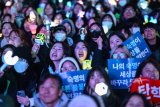 'I'm so happy': Tears of joy, K-pop on Seoul streets as Yoon impeached