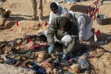 Bodies of about 100 Kurdish women, children found in Iraq mass grave