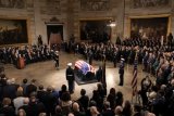 Former US Pres. Carter lies in state after somber Washington procession