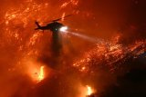 LA wildfires: 16 dead, 16 missing as fire crews try to corral blazes