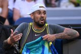 Sore, swearing Kyrgios out quick in Australian Open return