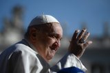 Pope Francis rests as Vatican reports new improvement