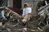 Town in volcano’s shadow hit by landslides it never expected