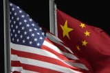 US charges former Fed official with spying for China