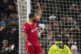 Salah sets goal record by inspiring Liverpool win over Tottenham