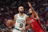 NBA: Celtics, behind hot shooting, overwhelm Rockets