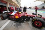 F1: Lewis Hamilton goes fastest for Ferrari as rain hits testing