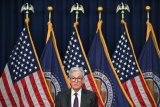 Powell says US Fed in no hurry to cut rates after pause