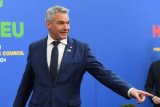 Austria's chancellor to step down after coalition talks collapse