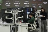 Asian stocks mostly up after US tech rally