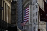 US stocks mixed as investors weigh latest Trump tariff broadside