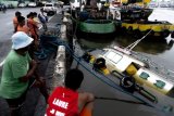 Sunken tugboat in Iloilo lifted up