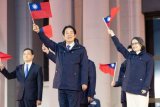 Taiwan's Lai says island must show 'determination' to defend itself