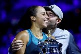 'Best honeymoon ever': Keys hails reluctant husband-coach after Slam win