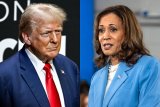 Harris, Trump push for every vote with just 14 days to go