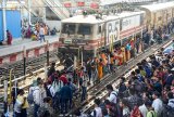 Mahakumbh devotees arriving by road dodge traffic jams by parking in nearby towns and boarding trains