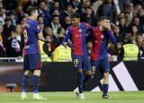 Barca snap Real's 42-game unbeaten streak in LaLiga with thrashing 4-0 win