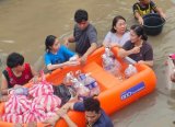 Former VP Leni braves floods, joins storm relief operations