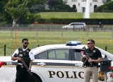 Armed man shot by Secret Service near White House