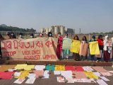 Demonstration in front of parliament protesting intimidation, violence against women