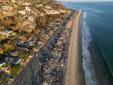 Milder winds help LA firefighters as Trump vows to visit