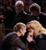 Adele bursts into tears as she embraces Céline Dion in Las Vegas