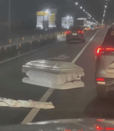 Coffins on the road snag traffic in NLEX near Pulilan Exit