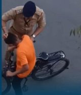 Video: Cop Slaps Boy, Pulls Hair For Cycling During PM Convoy Rehearsal