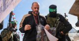 Hamas releases three hostages as Israel frees 369 Palestinian detainees