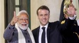 PM Modi greeted by 'friend' Macron in France