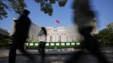 Record low yields prompt suspension of government bond purchases by China’s central bank