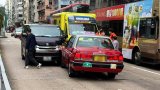 2 drivers taken to hospital after Hong Kong taxi, van collide