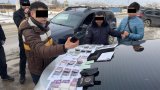 В Таласе задержаны инспекторы ОБДД за вымогательство взятки