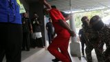 Public whipping in Malaysia sparks outrage, raising questions about sharia courts