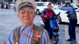 China volunteer directs traffic for decades after wife, kids, sister killed in car accidents