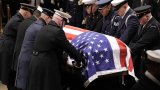 Former US president Jimmy Carter lies in state after sombre Washington procession